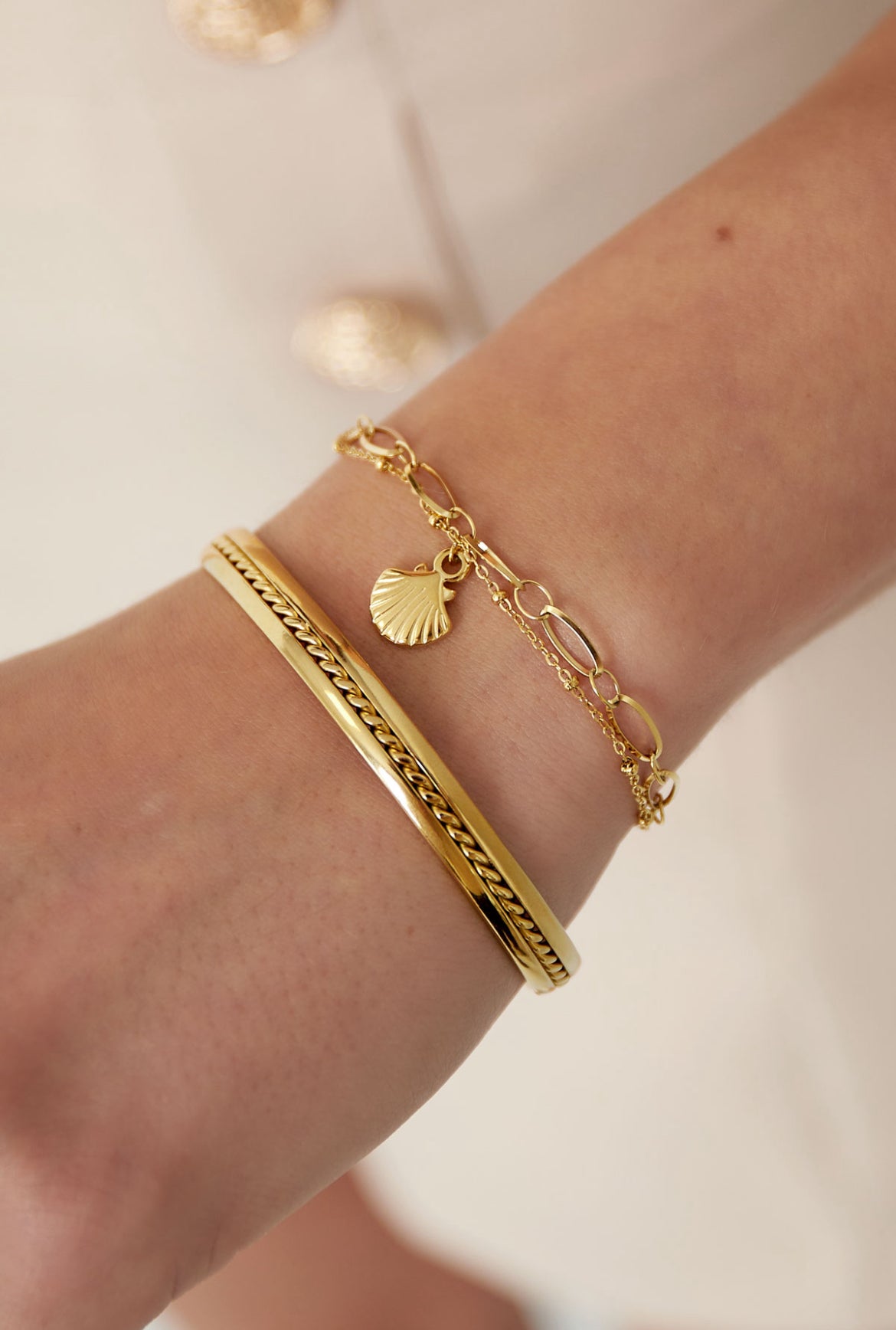 Armband met schelpje goud