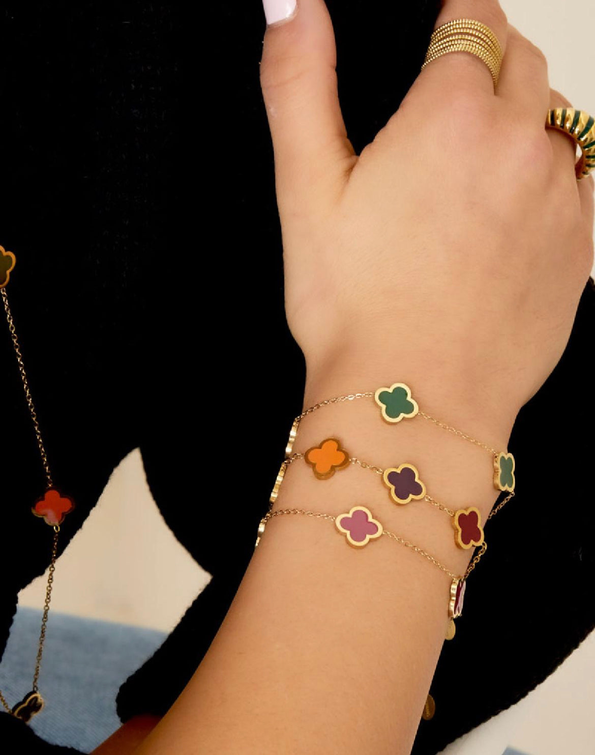 Armband Klaver goud met fuchsia
