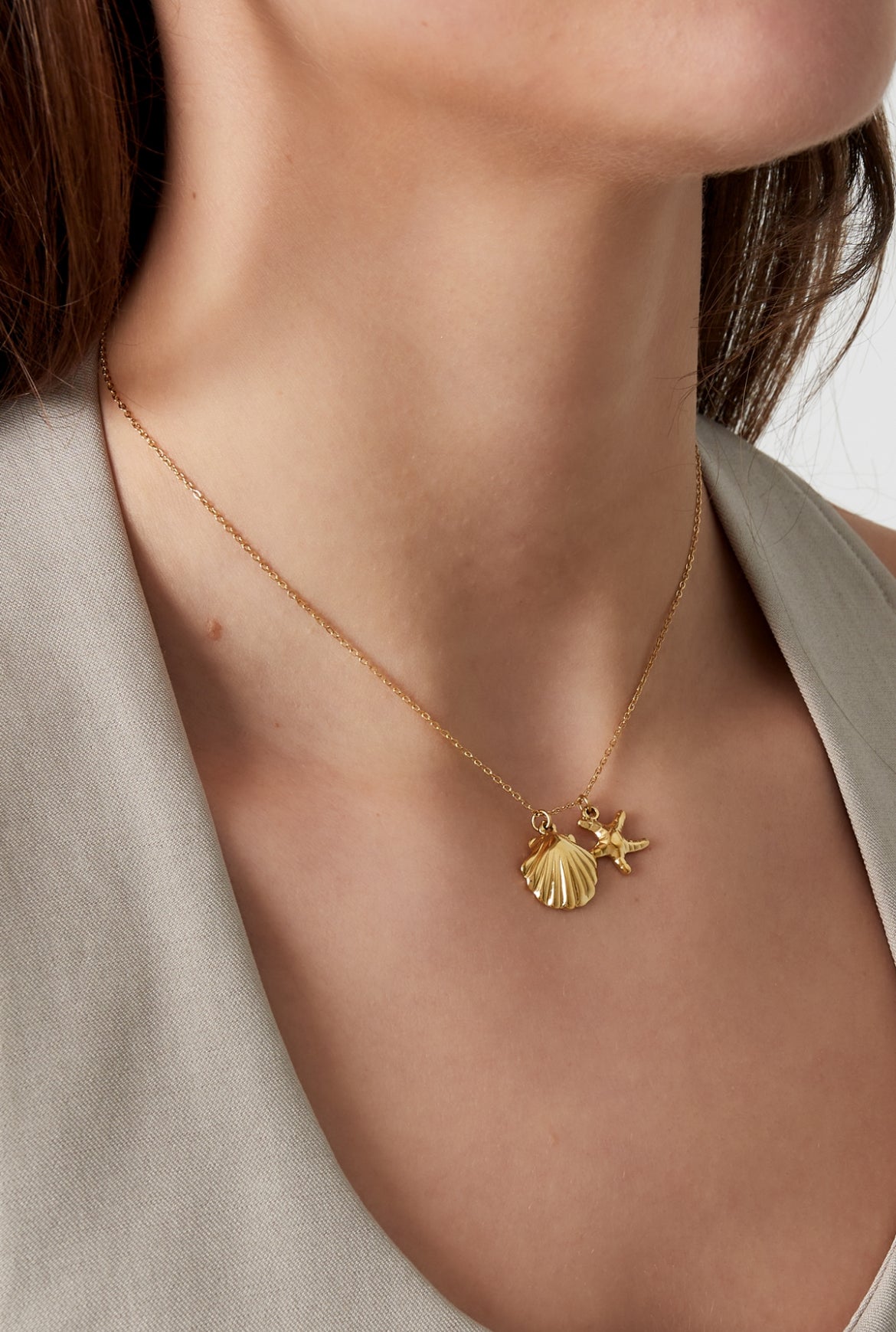 Ketting schelp en zeester bedel zilver
