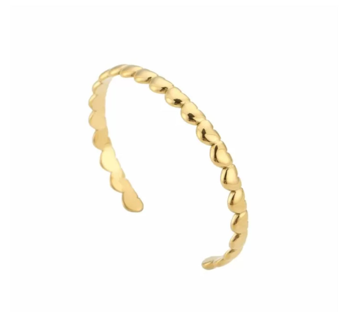 Bangle armband met hartjes goud