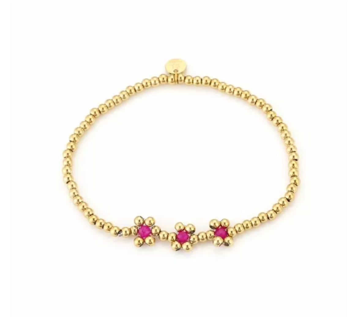 Armband met kralen en bloemen goud