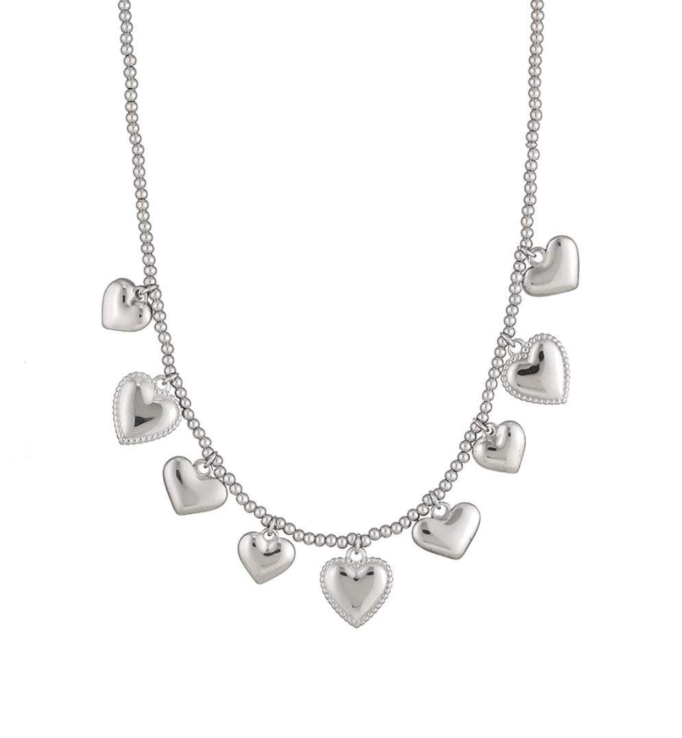 Bedel ketting met kleine hartjes zilver