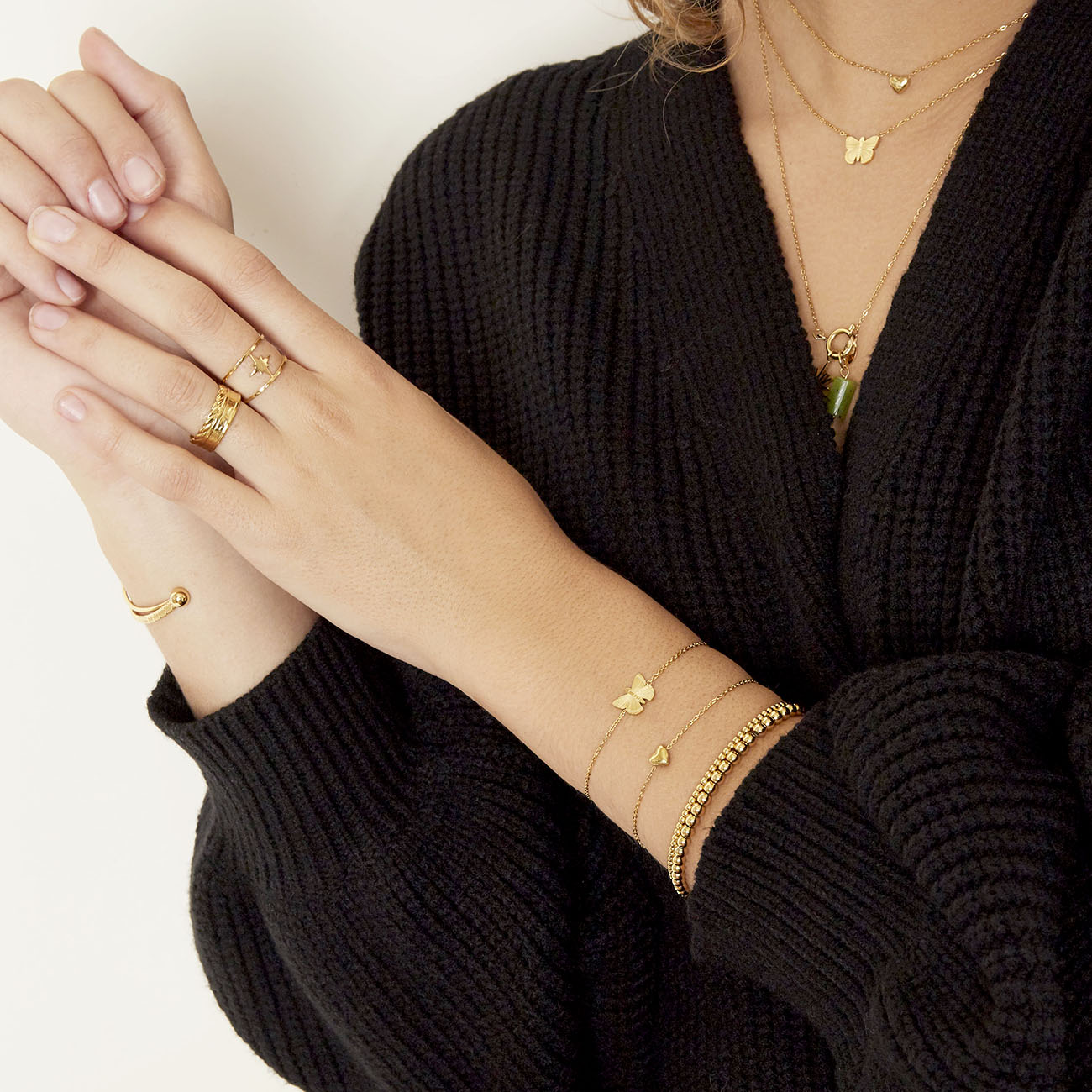 Armband vlinder goud