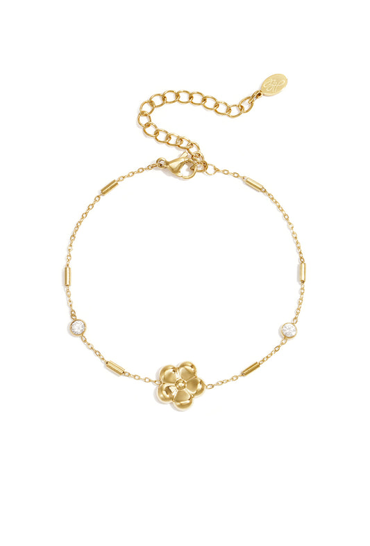Armband met bloem en steentjes goud