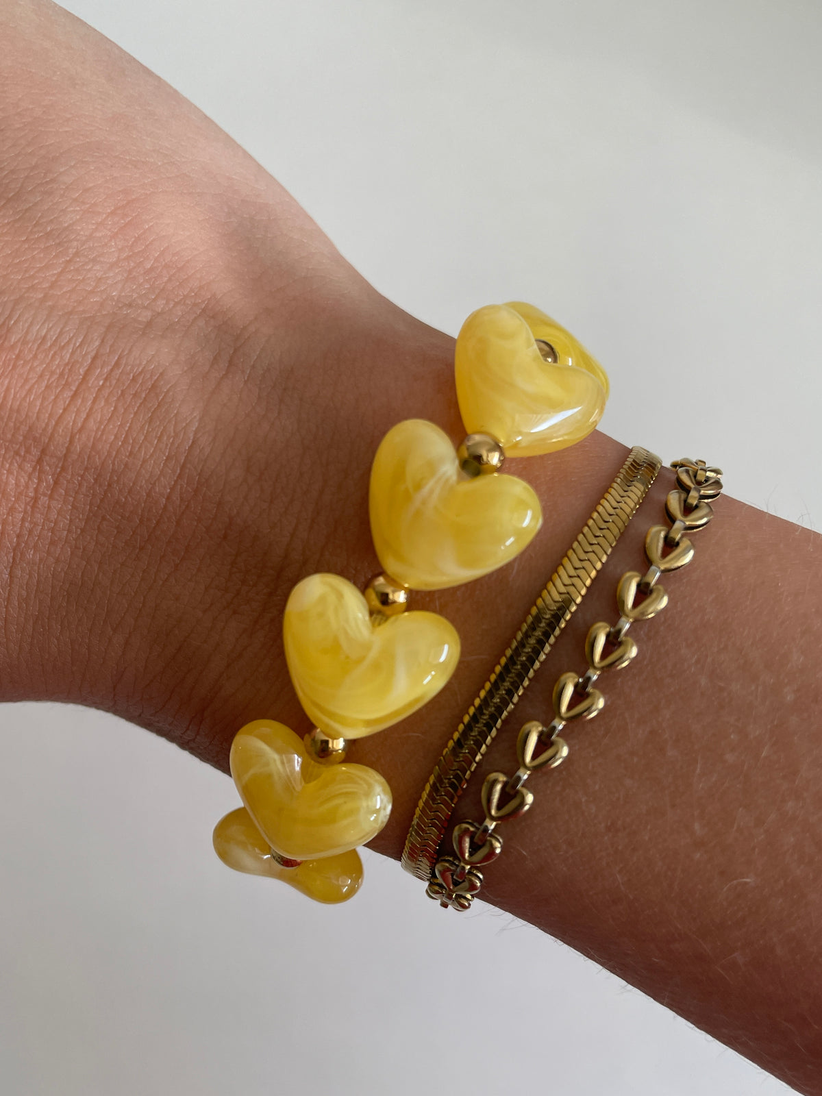 Armband met hartjes kralen geel