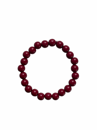 Armband met rode kralen