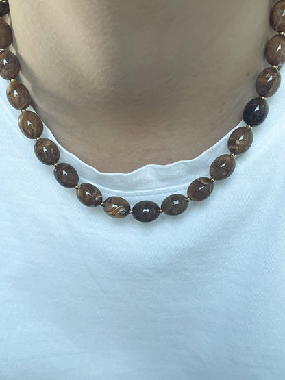 Bruine kralen ketting met gouden kralen