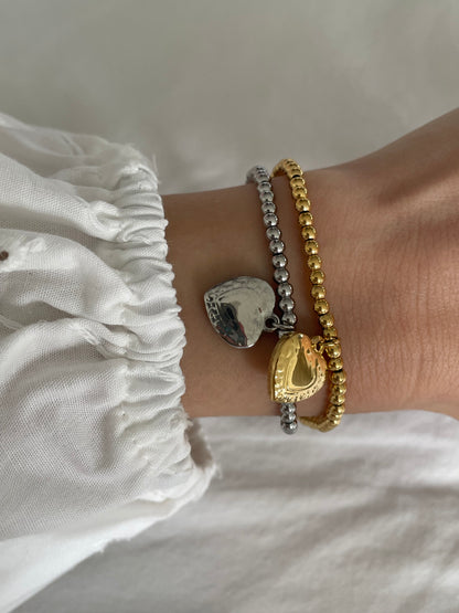 Armband met kraaltjes en hartjes bedel zilver