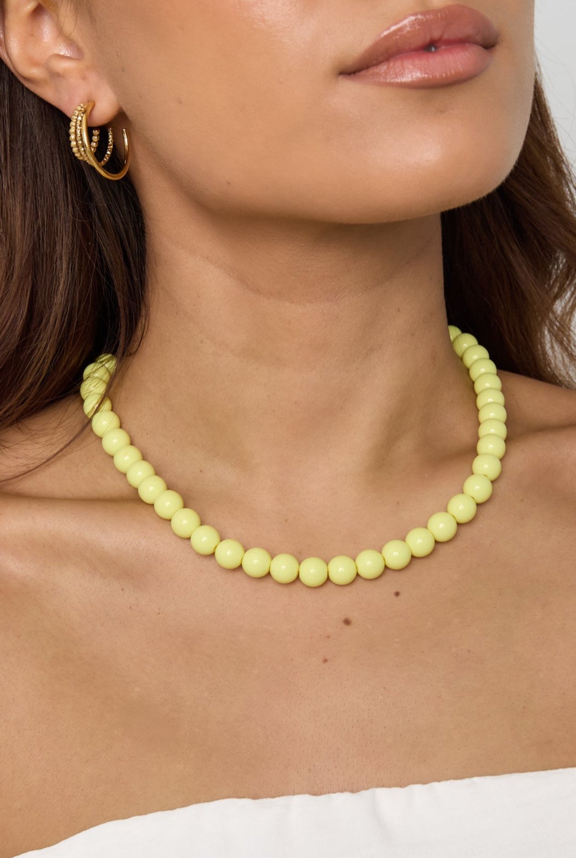 Ketting met licht gele kralen