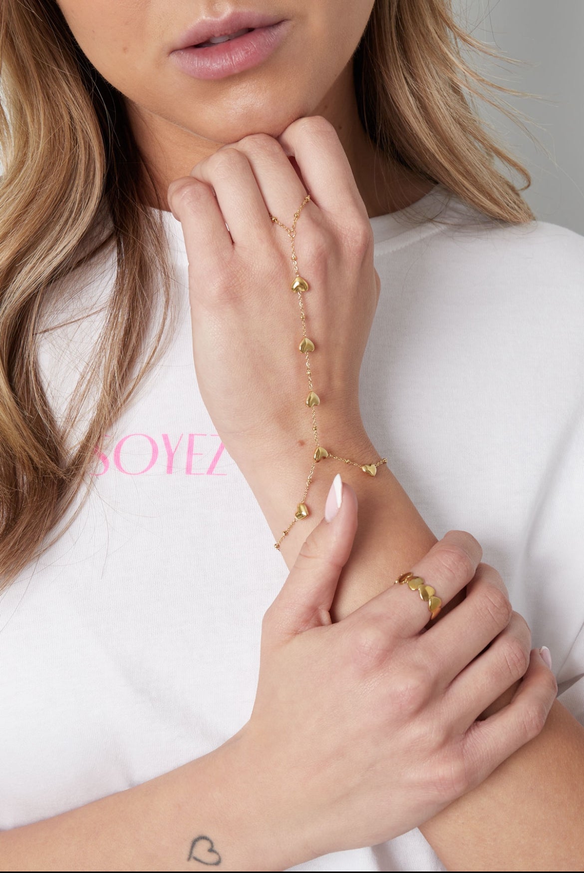 Handchain met hartjes goud of zilver