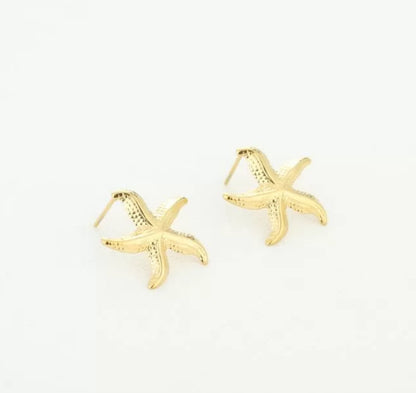 Oorbellen zeester goud