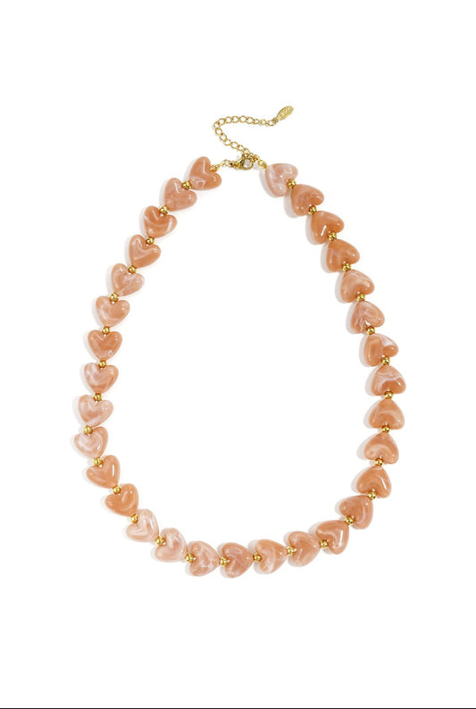 Kralen ketting met hartjes zalm roze