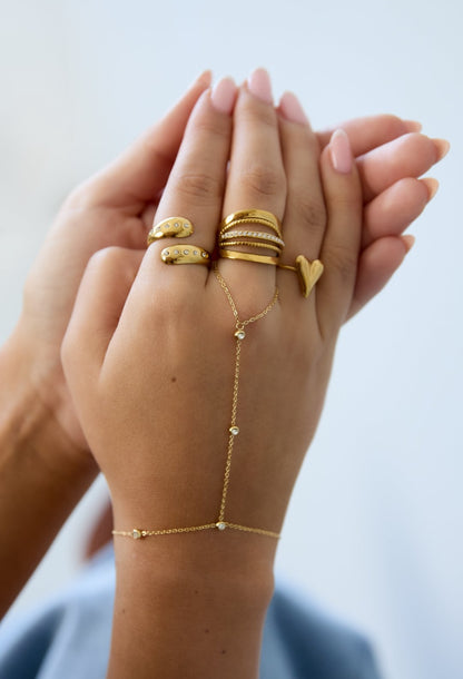 Handchain met steentjes goud